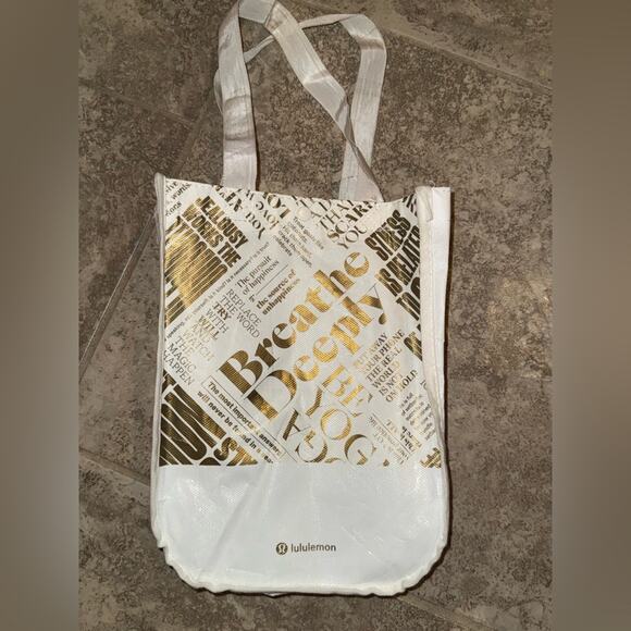 lululemon athletica Handbags - lululemon athletica White and Gold Graphic Tote